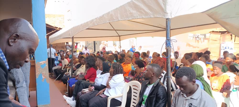 Community gathering under tents — Habibi Foundation Uganda